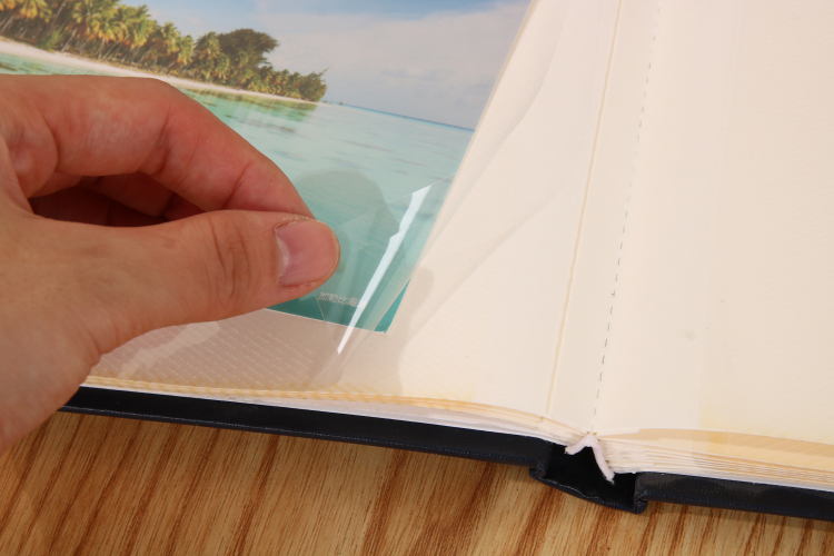 álbum de fotos con páginas de papel